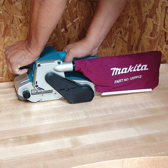 MAKITA 9903 pásová bruska 76*533mm 1010W