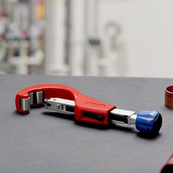 KNIPEX Tubix XL řezák velkých trubek pr.6-76mm, síla stěny až 2mm, pružinový mechanismus QuickLock