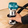 MAKITA RT0702C frézka kombinovaná 710W, 6/8mm,