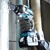 MAKITA DTW701Z aku rázový uťahovák 18V, 700Nm, 1/2" poistka kolík, bez batérie