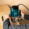 MAKITA RP2303FC07 horní frézka s regulací 2100W, kleštiny 6+8+12mm, systainer MAKPAC